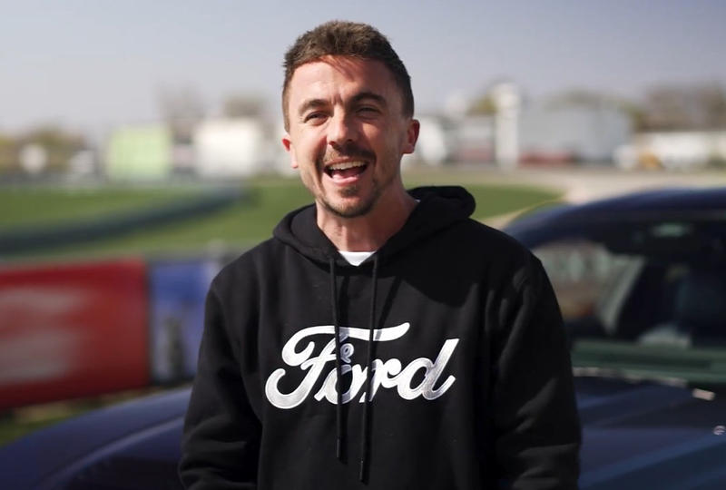 Frankie Muniz wearing a black Ford hoodie at M1 concourse
